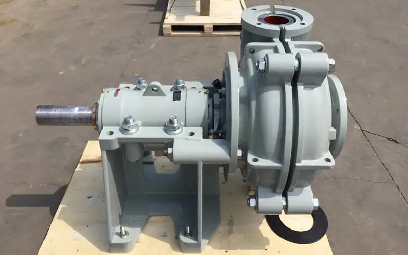 Horizontal slurry pump (industrial centrifugal slurry pump) on wooden pallet, side view with shaft and flanged connections-1