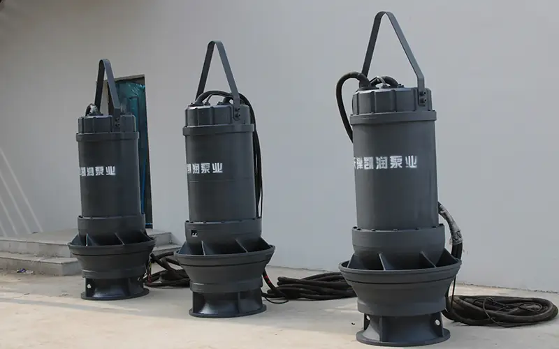 Three submersible axial flow pumps with brand marking