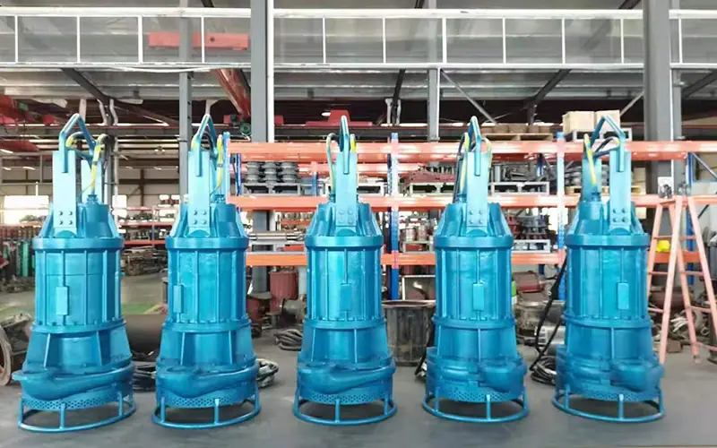 Five blue submersible slurry pumps in factory workshop-1