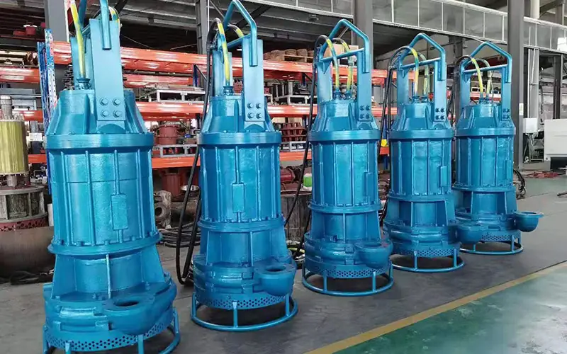 Five blue submersible slurry pumps in factory workshop-2