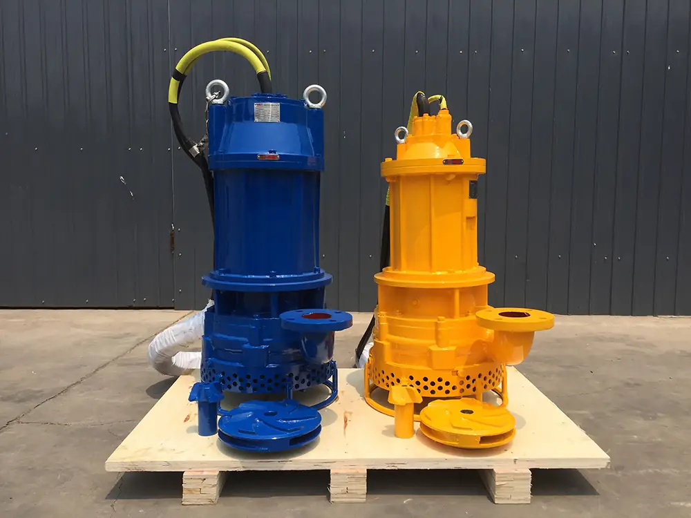 Heavy-duty submersible sewage cutter pump with a highlighted anti-clogging agitator blade at the base.